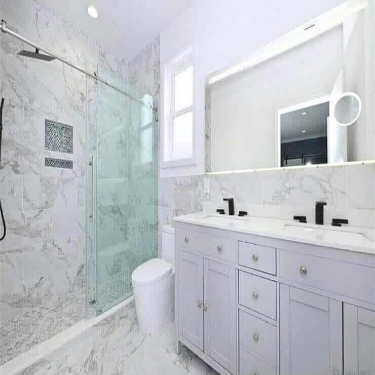 Bright Marble-Finish Bathroom with Double Vanity