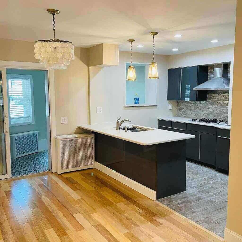 Modern Open-Concept Kitchen with Dark Cabinetry & Island